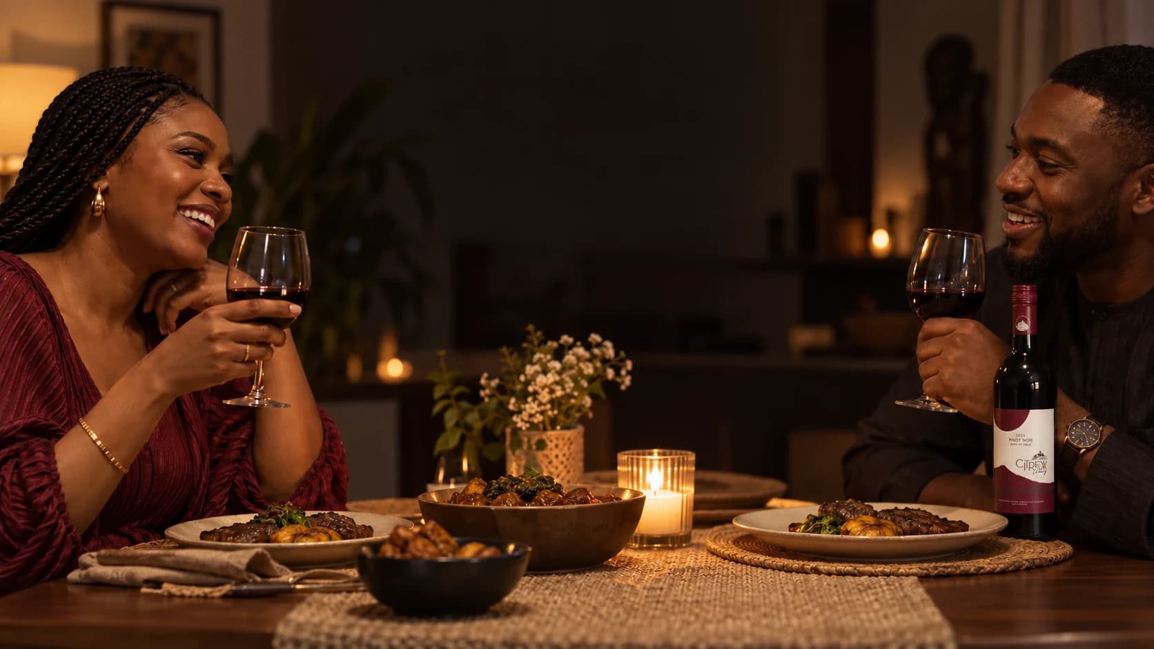 Black guests sharing Citrexx Pinot Noir over dinner