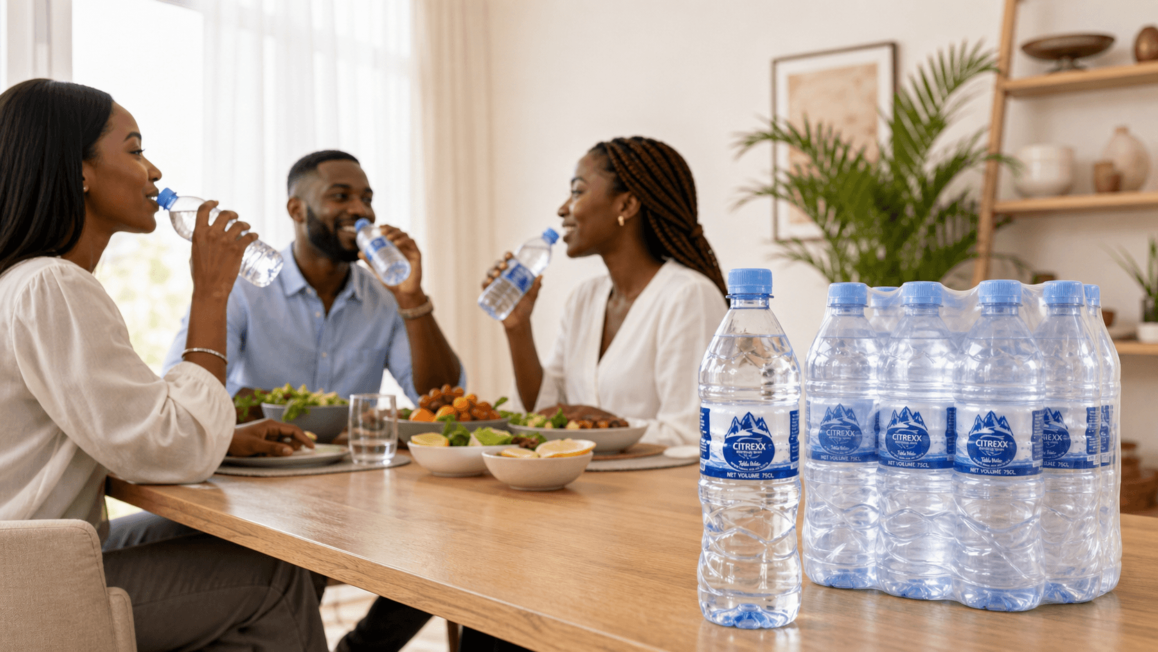 Adults drinking Citrexx water with a sealed pack on the table